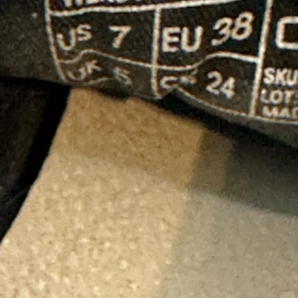 Hey Dude Black and White Sneakers with Slip-On Style